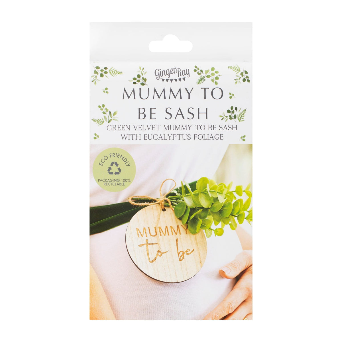 Verpakking van de buiksjerp ‘Mummy to be’ met een foto van de donkergroene band en houten badge op een zwangere buik.