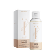 Naïf Verzachtende Babyolie in een transparante fles van 100 ml met witte dop, naast de verpakking.